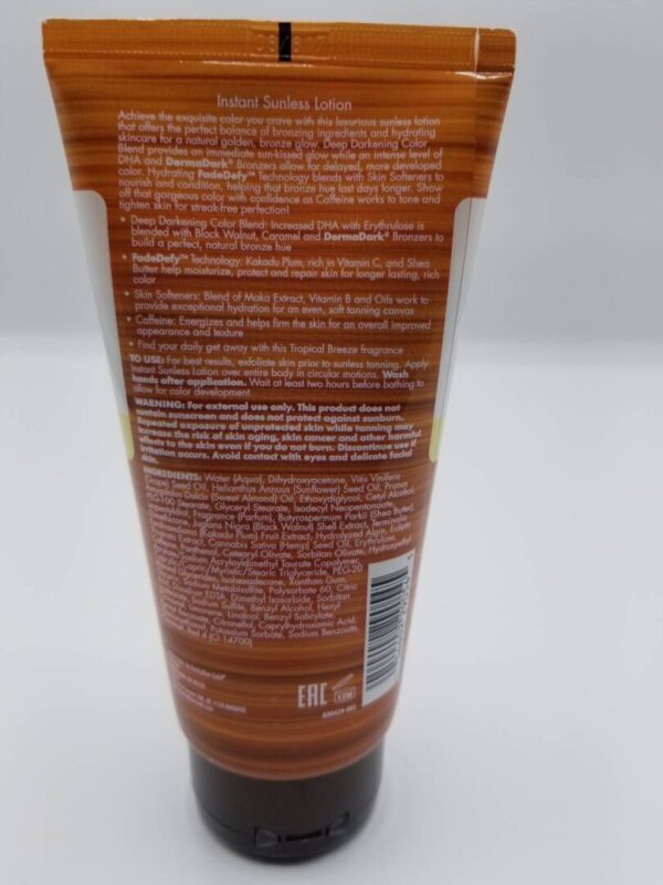 A close up of the back side of a tube of lotion