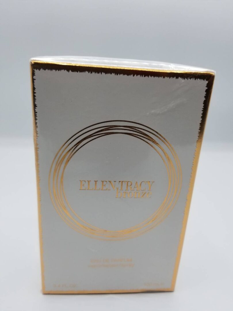 A white box with gold foil on top of it.