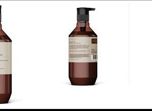 The Theorie Sage Argan Oil Restoring Shampoo for Severely Damaged Hair on a white background.