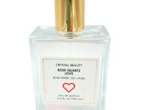 A bottle of CRYSTAL BEAUTY ROSE QUARTZ LOVE ROSE eau de parfum with a heart on it.