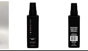 A black eyeliner pencil with a n:p beautiful Volumizing Spray next to it.