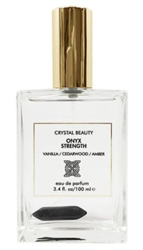 A bottle of CRYSTAL BEAUTY ONYX STRENGTH VANILLA/CEDARWOOD/AMBER eau de parfum 3.4 fl oz/100 ml.