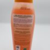 A bottle of shampoo on top of a table.