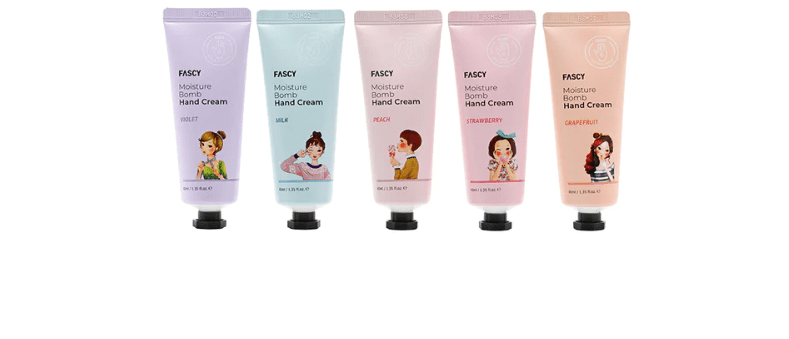 Five tubes of Maske Lab FASCY Assorted Tree Moisture Bomb Hand Cream with variations of lilac, peach, mint, strawberry, and grapefruit, each illustrated with different animated female characters.