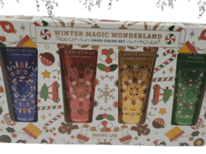 A gift box labeled "Maske Lab Winter Magic Wonderland Hand Cream Set of 4 (1 oz each)" with illustrations of four hand cream tubes in festive designs.