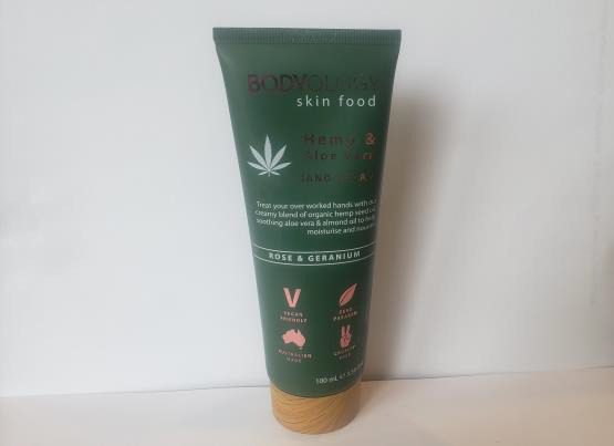 A tube of BODYOLOGY Hemp & Aloe Vera Hand Cream 100ml (3.38fl oz) on a white surface.