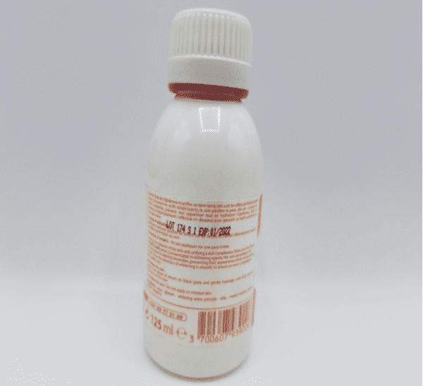 A bottle of Euro Cosmetics Plus Clair Lait Eclaircissant Intensif 500ml/17oz on a white surface.