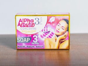 A box of ALPHA ARBUTIN CONCENTRE SOAP 3 plus 3 Day White 200g on a table.