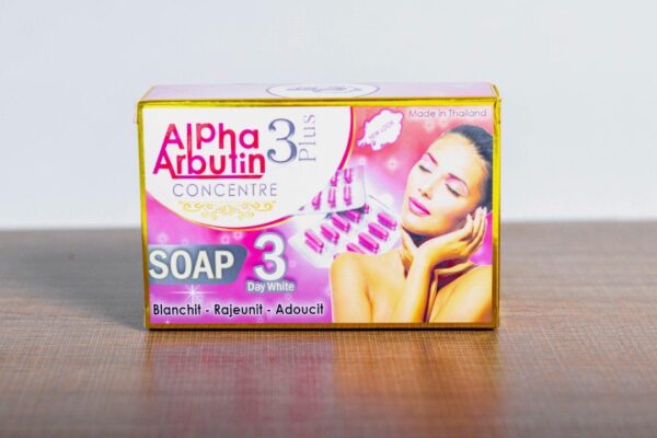 A box of ALPHA ARBUTIN CONCENTRE SOAP 3 plus 3 Day White 200g on a table.