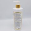 A Lait Teint Diamant Glutathione Strong Whitening Lotion - 500 ml bottle with a gold handle on a white background.