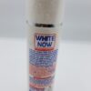 A White Now Super Fast Clarifying Lotion spray bottle on a white surface.