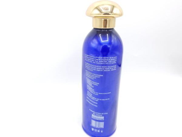 A blue Glutathione Injection Gluta Kojic White + Illuminateur Lotion bottle with a gold cap on a white background.