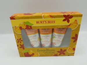 A Burt's Bees Hand Cream Trio Gift Set - 3X Orange Blossom & Pistachio in a box.