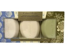 Three Crabtree & Evelyn Essentials Bar Soap Trio - La Source, Goat Milk, Gardeners in a box on a white background.