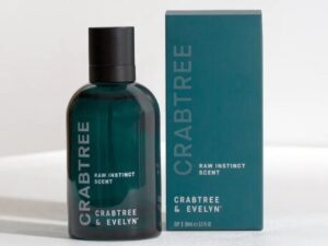 A bottle of CRABTREE & EVELYN RAW INSTINCT SCENT EAU DE PARFUM 95ML 3.2FL OZ next to a box.