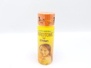 A bottle of CAROTENE DSP 10 COLLAGEN FORMULA BRIGHTENING OIL SERUM CLARIFIANT on a white background.