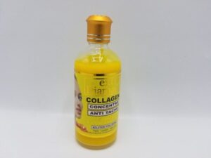 Extra Diamant COLLAGEN CONCENTRE ANTI TACHE 100ML bottle of yellow liquid on a white surface.