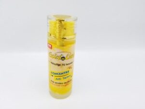 A yellow tube of ECLAT DE LUNE 72-Hour Result Anti-Spot Concentrate with Fruit Acids 70ml lip balm with a gold cap.