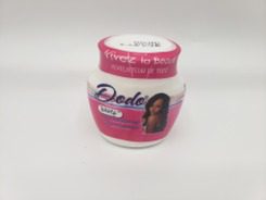 A jar of Dodo Moisturising Beauty Lightening Cream on a white surface.