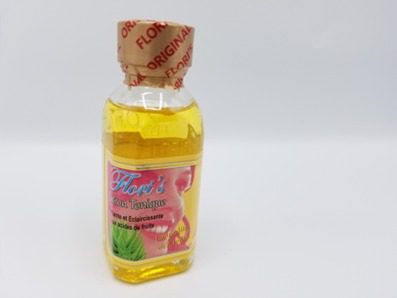 A bottle of FLORI'S LOTION TONIQUE PURIFIANTE ET ECLAIRCISSANTE AUX ACIDES DE FRUITS on a white background.