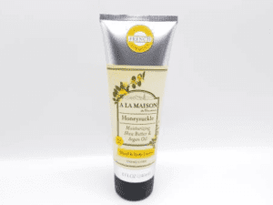 A tube of A LA MAISON Honeysuckle Moisturizing Shea Butter & Argan Oil Hand & Body Lotion 8 FLOZ (240ml) on a white background.