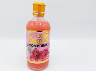 A bottle with a EXTRA DIAMANT COMPRIME bottle on a white background.