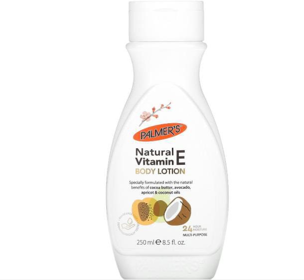 A bottle of PALMER'S Natural Vitamin BODY LOTION 24 HOUR MOISTURE250mle 8.5fl.oz with coconut oil.