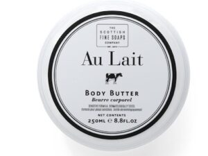 Top view of a round container of SCOTTISH FINE SOAPS Au Lait Body Butter, labeled in black on white background.