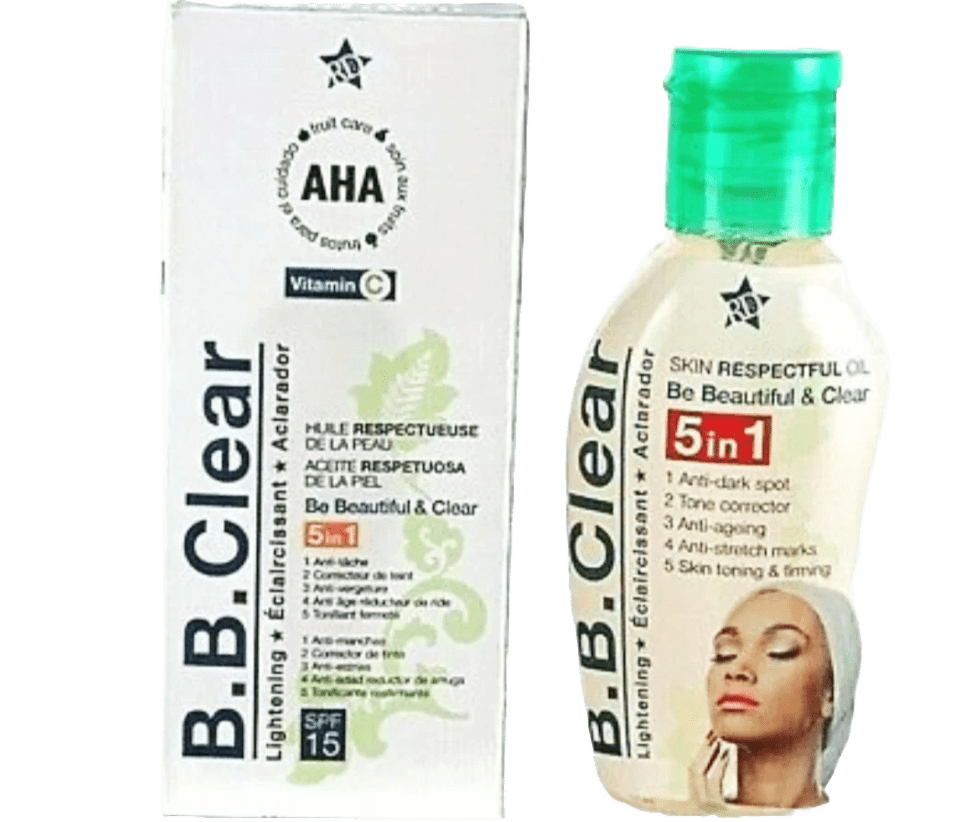 Two B.B. Clear Skin Respectful Oil products: a white cardboard box labeled "AHA Vitamin C" and an adjacent bottle labeled "Vitamin C skin oil for dark spots." Both feature branding and skin benefits.