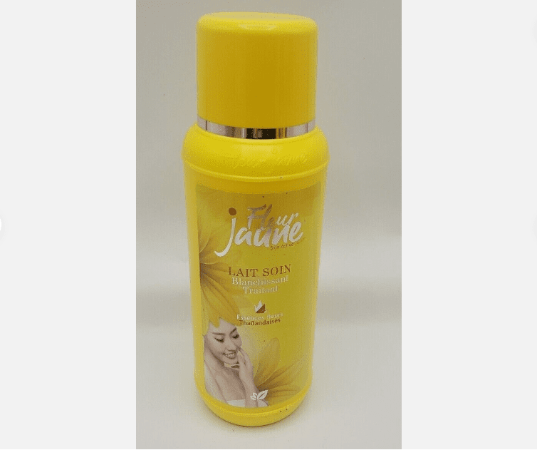 Transformative Fleur Jaune Body Lotion Soin Blanchissant Traitant sunscreen lotion bottle with the brand "j'aime" labeled in white and an image of a woman's face on the front, set against a plain background.