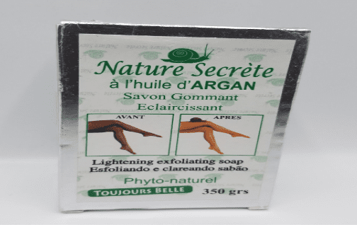 A package of Nature Secrete Argan Lightening Moisturizing Body Soap 350g, displaying before and after skin images, with french text, weighing 350 grams.