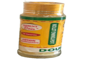 A jar of Piment Doux 24 Heures Whitening Lotion with a yellow label.