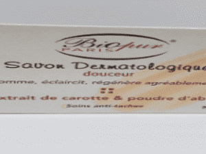 A box of Biopur Paris Gentle Dermatological Soap Savon Dermatologique Douceur with carrot extract and apricot powder, labeled in French.