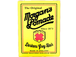 Vintage label for "Morgan's Pomade Darkens Grey Hair 100g/3.53oz" on a yellow background, stating "grey hair darkening pomade" and "made in England", with a red apple graphic.